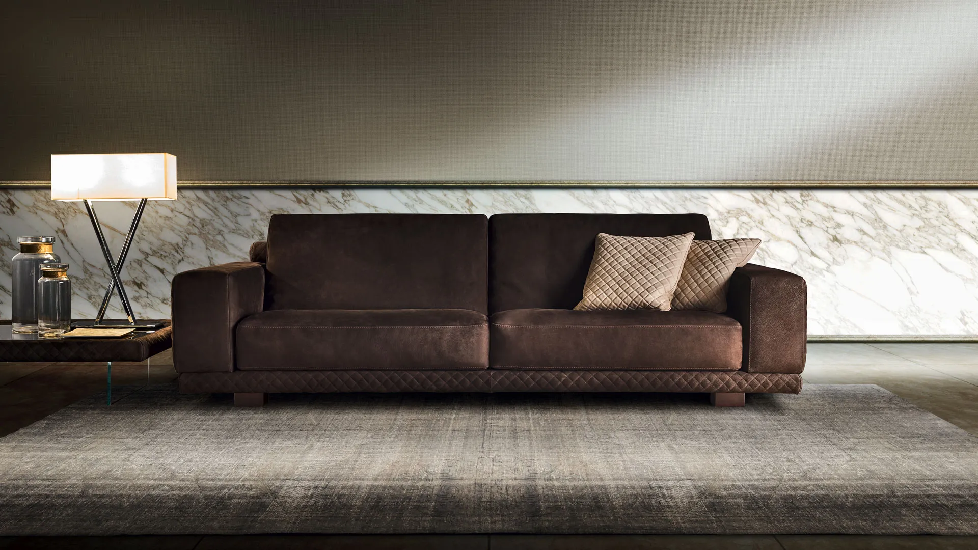 Channel tufted diamond feather sofa by Lof's.